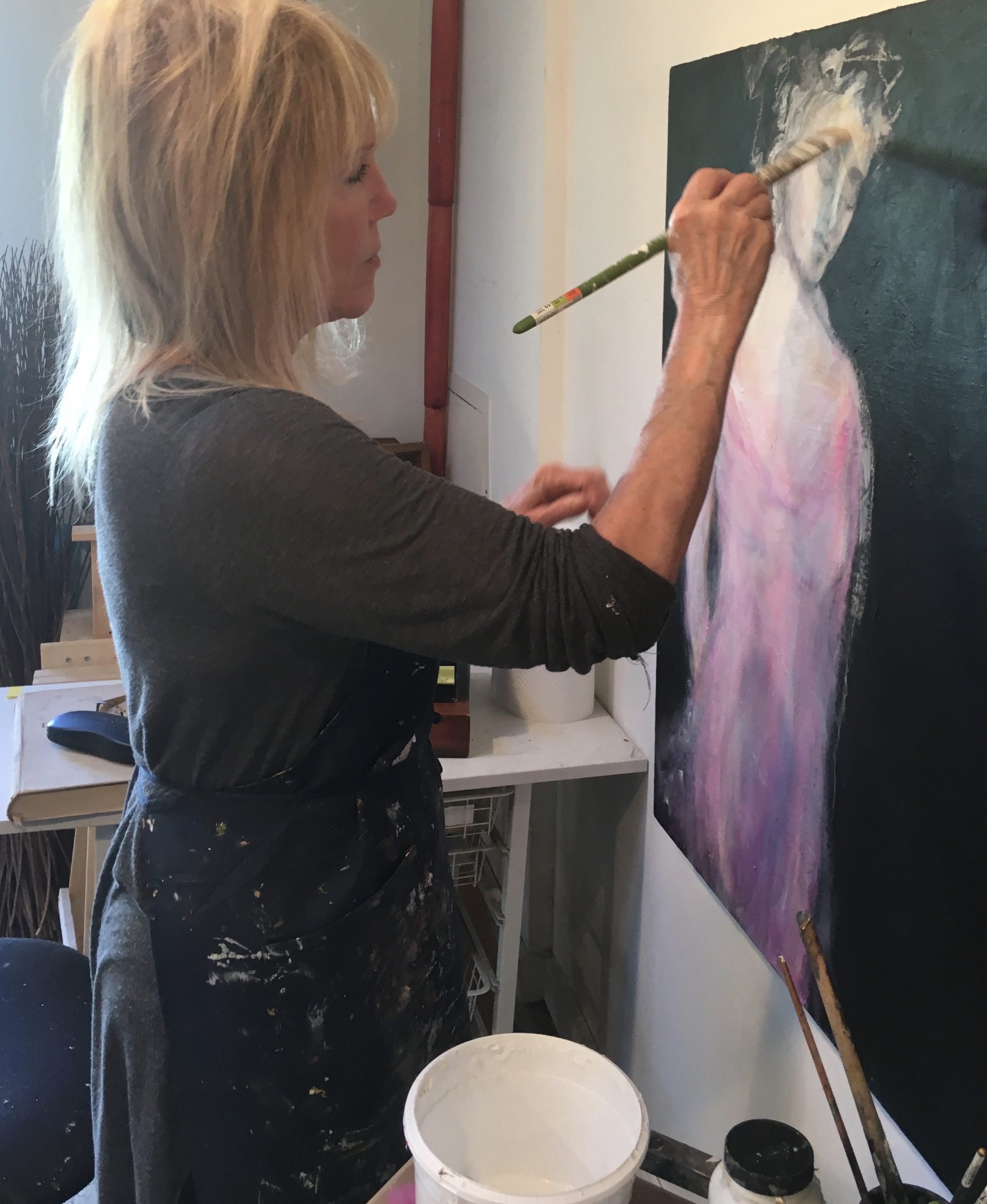 Julie Maxwell doing painting
