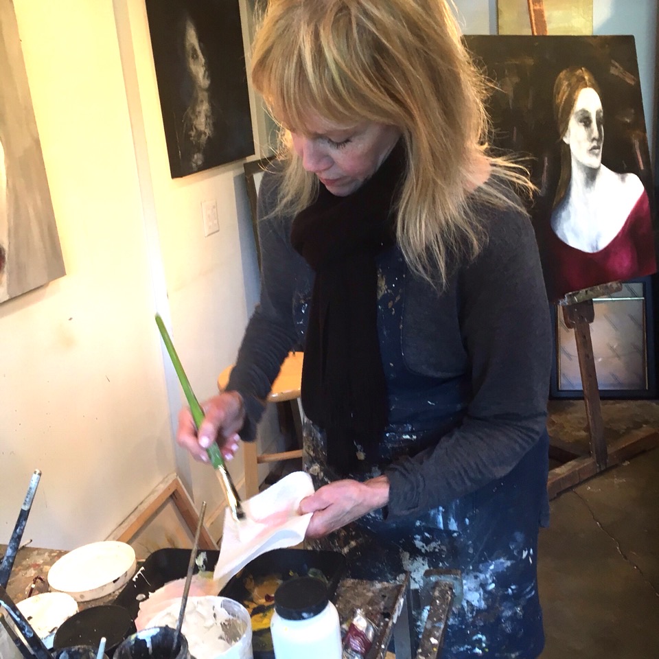 Julie Maxwell doing painting